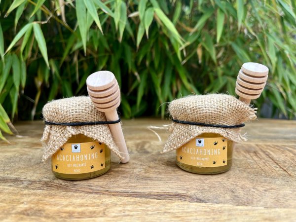 Honingpotje met lepeltje Honingpotje met lepeltje
